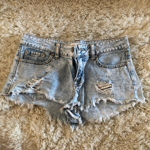 Bullhead low rise acid wash ripped denim shorts